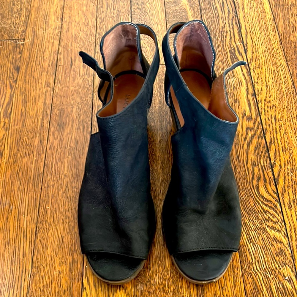 Black chunky heeled shoes.